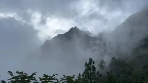 Dark clouds and hills view at rainy day Stock Footage 276256353