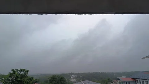 Dark Clouds and Rainfall View from Balcony Stock Footage 313149637
