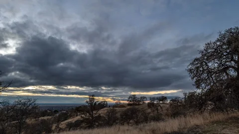 Dark Clouds and Sunset in Oak Grassland in California Timelapse Stock Footage 285616873