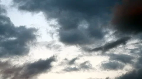 Dark clouds on a background of a bright sky. Stock Footage 67559200