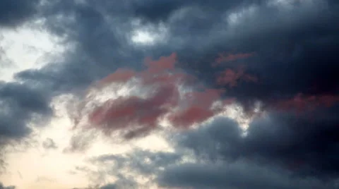 Dark clouds on a background of a bright sky. Stock Footage 67560576