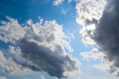 Dark clouds in a blue sky close-up. Foto stock