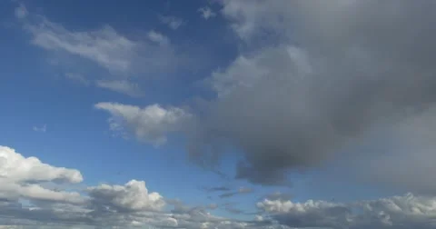 Dark clouds on the blue sky Stock Footage 50578426