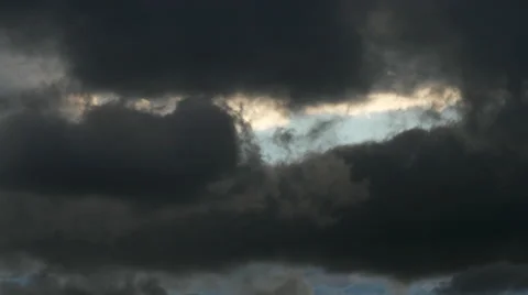 Dark Clouds with Blue Sky Peaking Out Timelapse 4k Видео 53233276