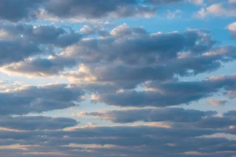 Dark clouds in the blue sky Stock Photos