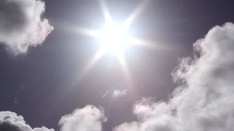 Dark clouds with bright sun beams - sky background with sunrays - Time Lapse Stock Footage 153953614