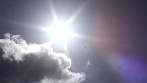 Dark clouds, bright sun beams - sky background, sunrays, bird, plane - real time Stock Footage 153953785