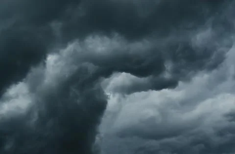 Dark Clouds closeup on the Sky Background. rain cloud, storm cloud before a t Stock Photos