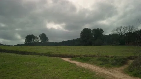 Dark clouds on the countryside Stock Footage 159952386