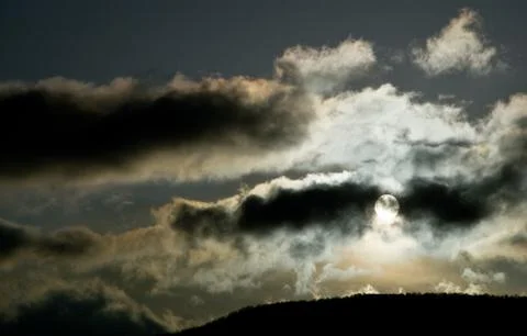 Dark clouds covering the sun pollution global warming Stock Photos