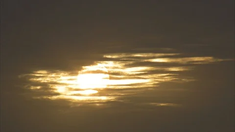 Dark clouds covering the sun at sunset Stock Footage 89071439
