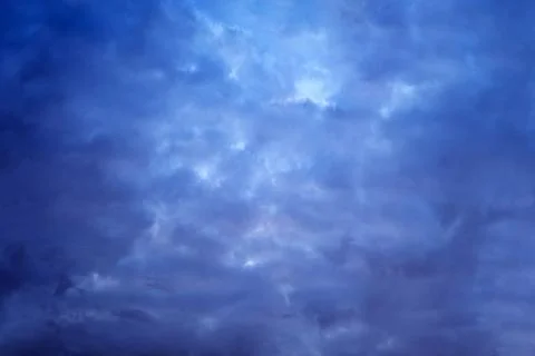 Dark clouds in a dramatic sky. Storm clouds of deep blue color 写真素材