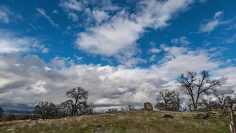 Dark Clouds Gather over Ranchland in California's Sierra Nevada Stock Footage 282422963
