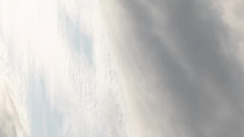 Dark Clouds Getting Bright in a Sunset Sky (vertical/time lapse) Stock Footage 123291009