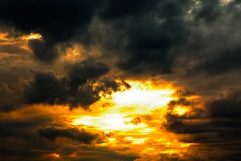 Dark clouds with glowing Stock Photos