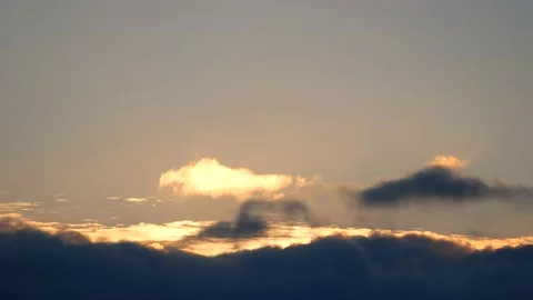 Dark clouds with golden sun beams - sky background with sunrays - Time Lapse Stock Footage 154671031