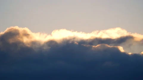 Dark clouds with golden sun beams - sky background, bird, sunrise - real time Stock Footage 154681871