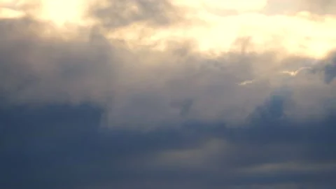 Dark clouds with golden sun beams - sky background, sunrise - Time Lapse Stock Footage 154692952