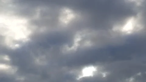 Dark clouds with golden sun beams - sky background, sunrise - Time Lapse Stock Footage 154697901