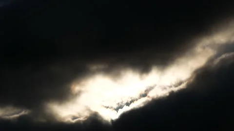 Dark clouds with golden sun beams - sky background, sunrise - Time Lapse Stock Footage 154698151