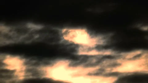 Dark clouds with golden sun beams - sky background, sunrise - Time Lapse Stock Footage 154746709