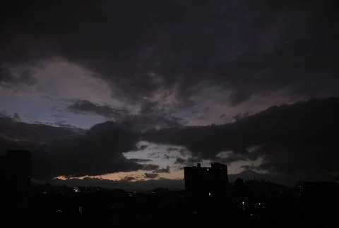 Dark clouds hover over Sana'a, Sanaa, Yemen - 18 Dec 2025 Fotos Stock