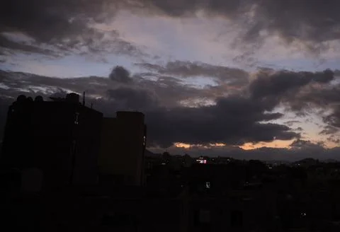 Dark clouds hover over Sana'a, Sanaa, Yemen - 18 Dec 2025 Fotos Stock