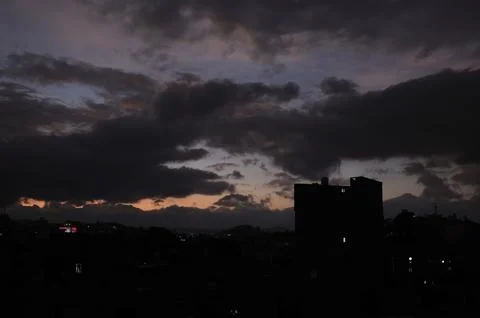 Dark clouds hover over Sana'a, Sanaa, Yemen - 18 Dec 2025 Fotos Stock