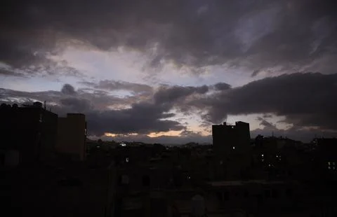Dark clouds hover over Sana'a, Sanaa, Yemen - 18 Dec 2025 Fotos Stock