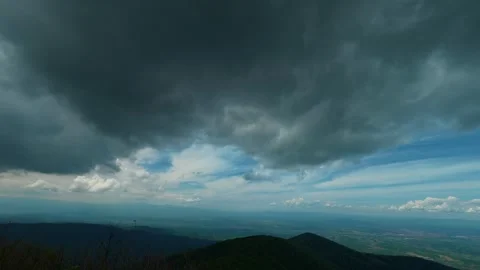 Dark clouds loom overhead, heavy and threatening. Jastrebac Mountain, Serbia. Stock Footage 336024326