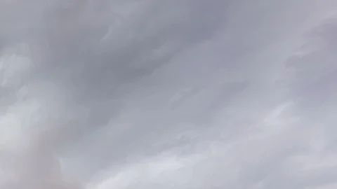 Dark clouds move across the blue sky. Stormy weather. Stock Footage 87327112