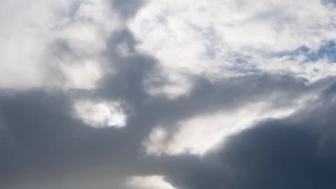 Dark clouds move in front of sun time lapse Video stock 109258229