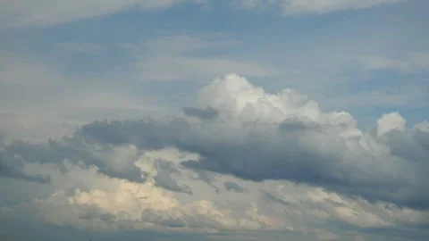 Dark Clouds Move In As Light Clouds Drift Above. Time Of Day Shows Progression Stock Footage 343766239