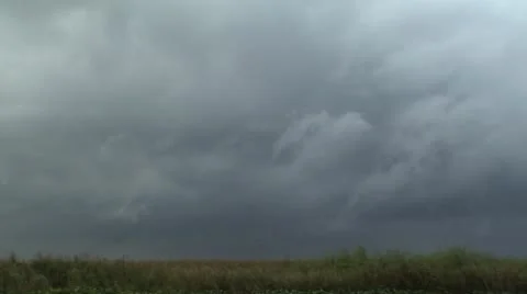 Dark Clouds Move over Marsh, the Everglades Florida Video Video stock 12761500