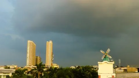 Dark clouds moved quickly over the city ahead of heavy rain. Copy space Fotos Stock
