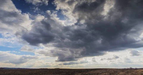 Dark clouds moving fast across the sky Stock Footage 126489741
