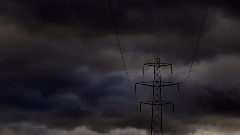 Dark Clouds moving over pylon 4K England UK Stock-Footage 99126342