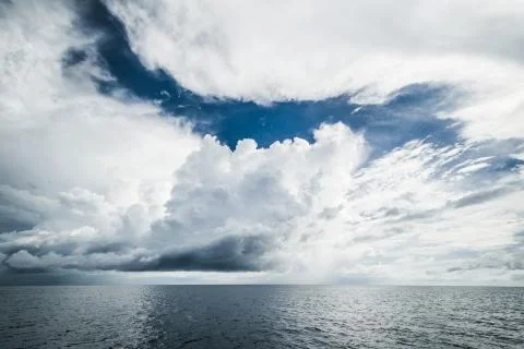 Dark clouds in open ocean Stock-Fotos