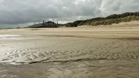 Dark clouds over the beach in the summer Stock Footage 256028086