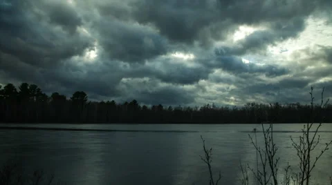 Dark clouds over lake 스톡 동영상 40107071