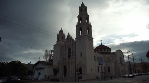 Dark clouds over Mission San Francisco de Asis at rush hour Stock Footage 241194009