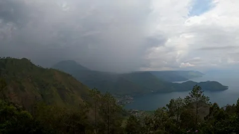 Dark Clouds Over Mountain Lake in Sumatra – 4K Time Lapse Stock Footage 341254493