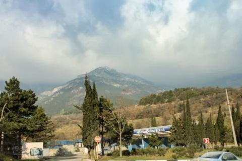 Dark clouds over the mountain. Stock Photos
