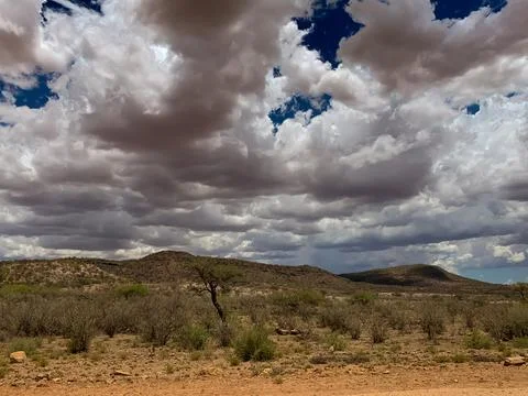 Dark clouds over open land Foto stock