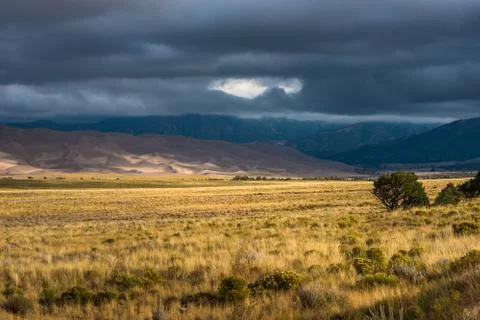 Dark Clouds over the Sand Dunes Colorado USA Landscapes Stock Photos