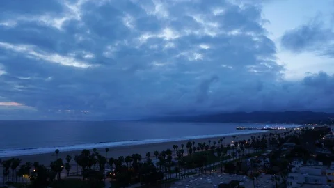 Dark clouds over Santa Monica pier at sunset 스톡 동영상 89166436