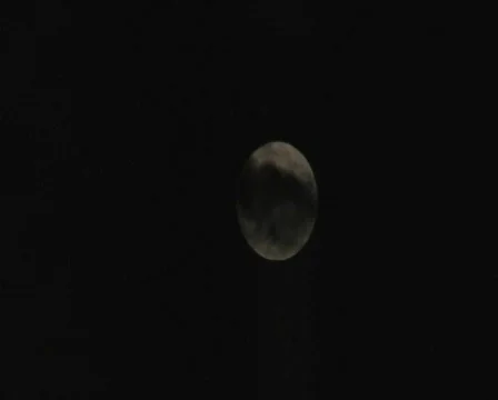 Dark clouds pass the Moon Stock-Footage 85711