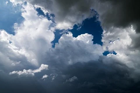 Dark clouds before rain storm. Natural background Stock Photos