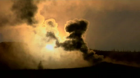 Dark clouds rise from a volcanic eruption in a geothermal Stock Footage