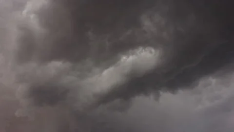 Dark clouds roll in, obscuring blue sky, 4K. Stock Footage 139749862